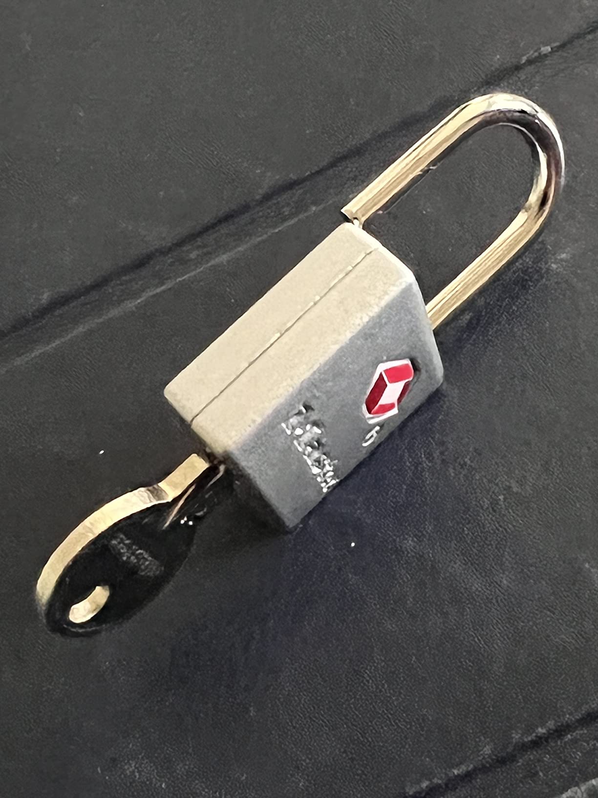 Master Lock TSA Luggage Lock Keyed Alike, Brass and Nickel, 4-Pack 4683Q customer photo 1